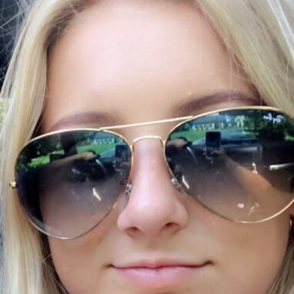 Large blue lens ray bans